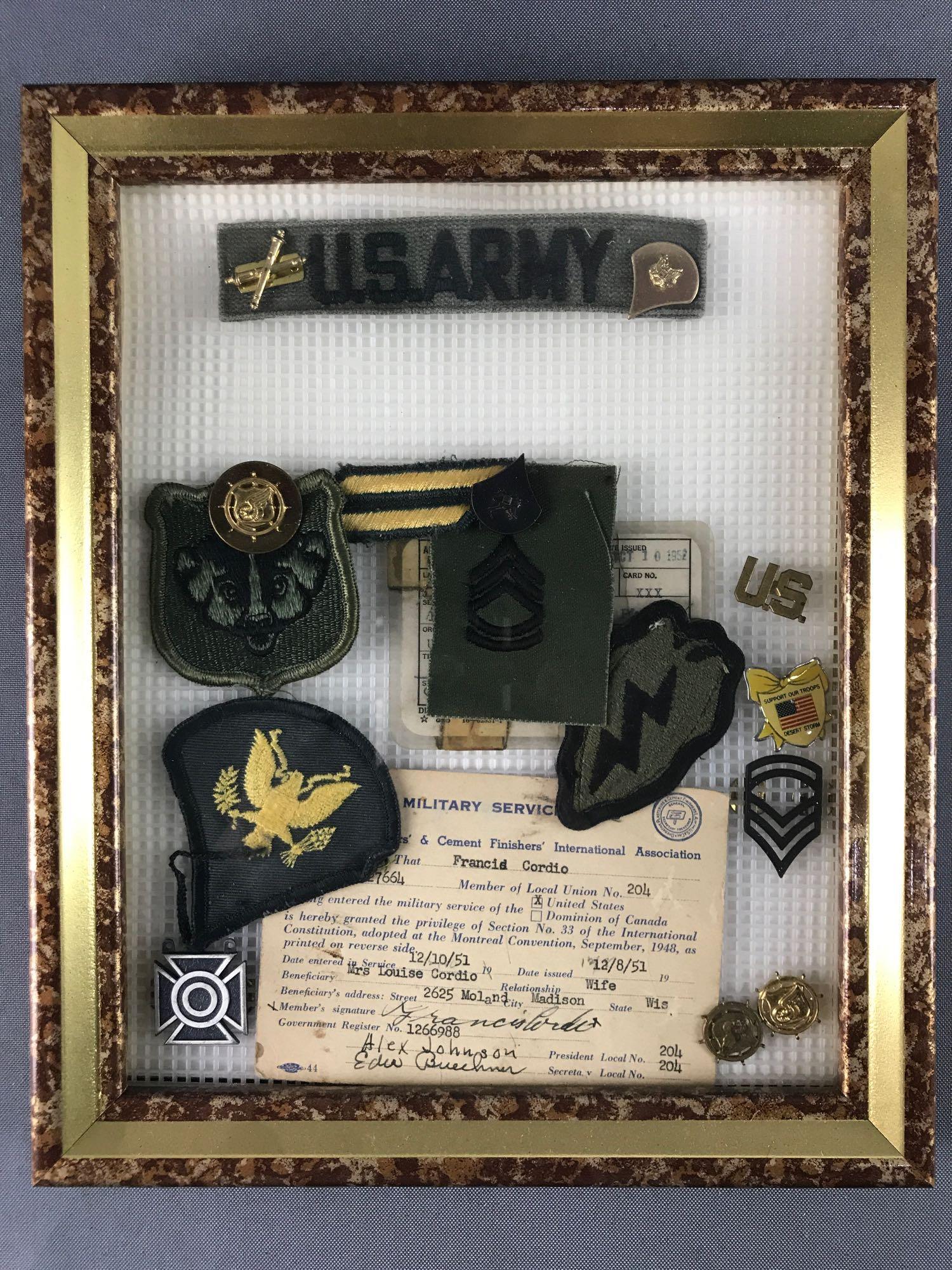 Framed collection of assorted US Military insignia and (1 of 4)