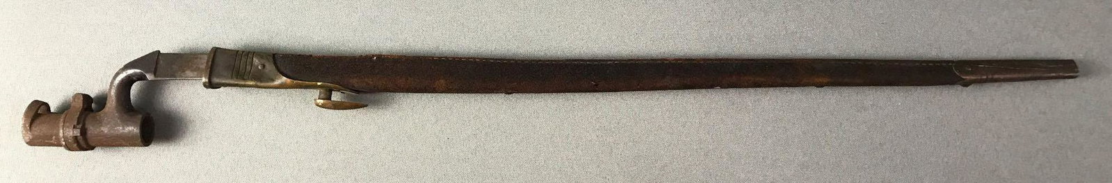 Civil War Rifle Bayonet with Scabbard: Measures 27x2.5 inches.