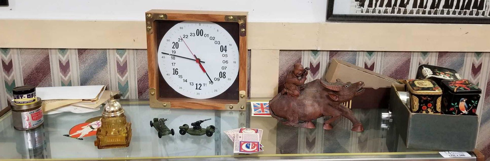 Group of vintage items: Tins, gloves, toys and more