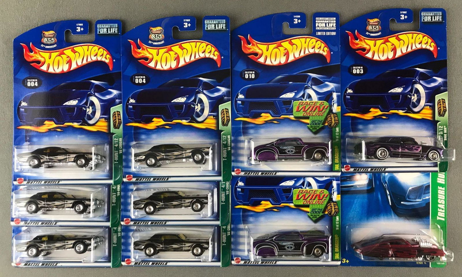 Group of 10 Hot Wheels Treasure Hunt die-cast vehicles: Includes (6) 68 Cougar, (2) Tail Dragger, Evil Twin, and Shoe Box