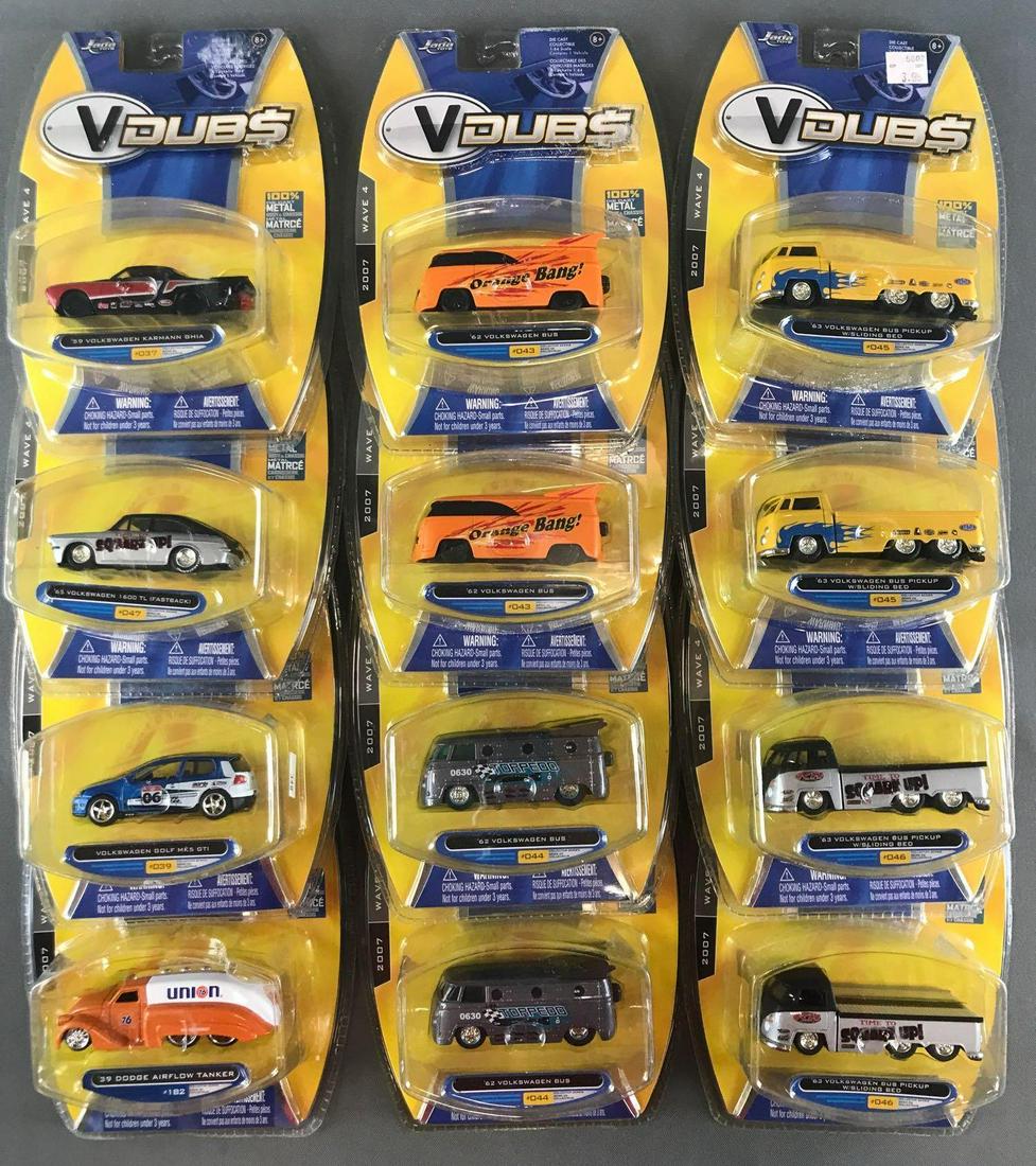 Group of 12 Jada Toys VDubs/Dub City die-cast vehicles: Includes 62 Volkswagen Bus, 59 Volkswagen Karmann Ghia, 39 Dodge Airflow Tanker, and more. 1:64 scale. Some shelf wear