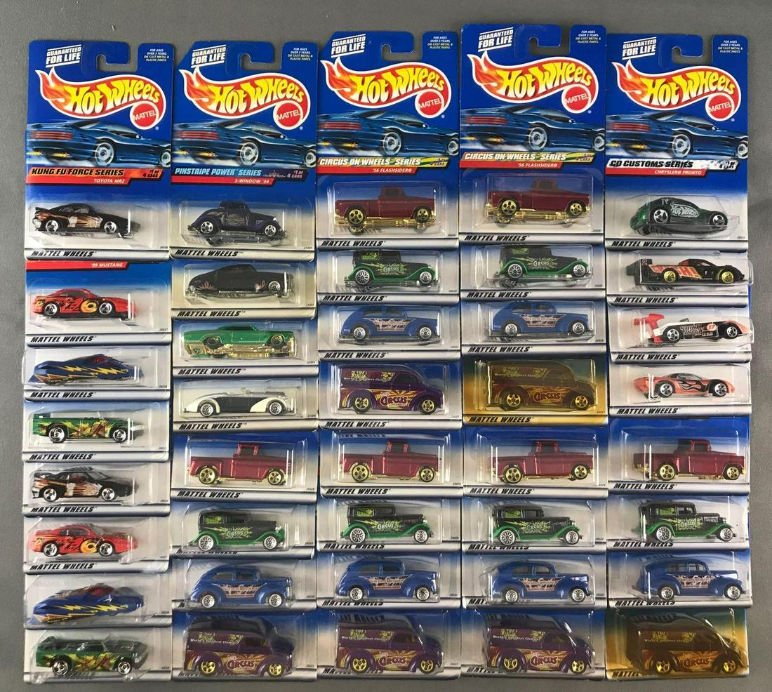 Group of 40 Hot Wheels die-cast vehicles in original: (10) 4-vehicle series including Circus on Wheels, Pinstripe Power, CD Customs, and Kung Fu Force. Some minor damage to packaging and shelf wear
