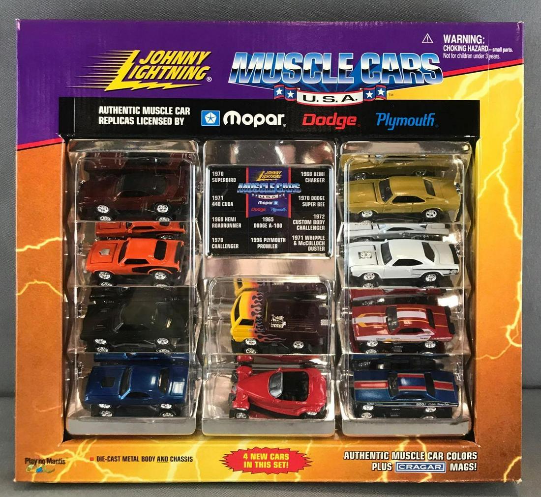 Johnny Lightning Muscle Cats USA die-cast vehicle set: 10 vehicles including 1970 Superbird, 1958 Hemi Charger, 1970 Challenger, and more. Packaging measures 14x13 inches. Some shelf wear