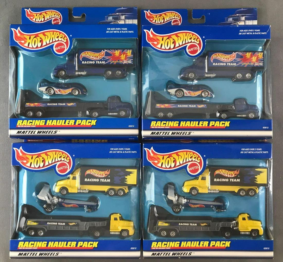 Group of 4 Hot Wheels Racing Hauler Pack die-cast: Some damage to packaging. 2 styles