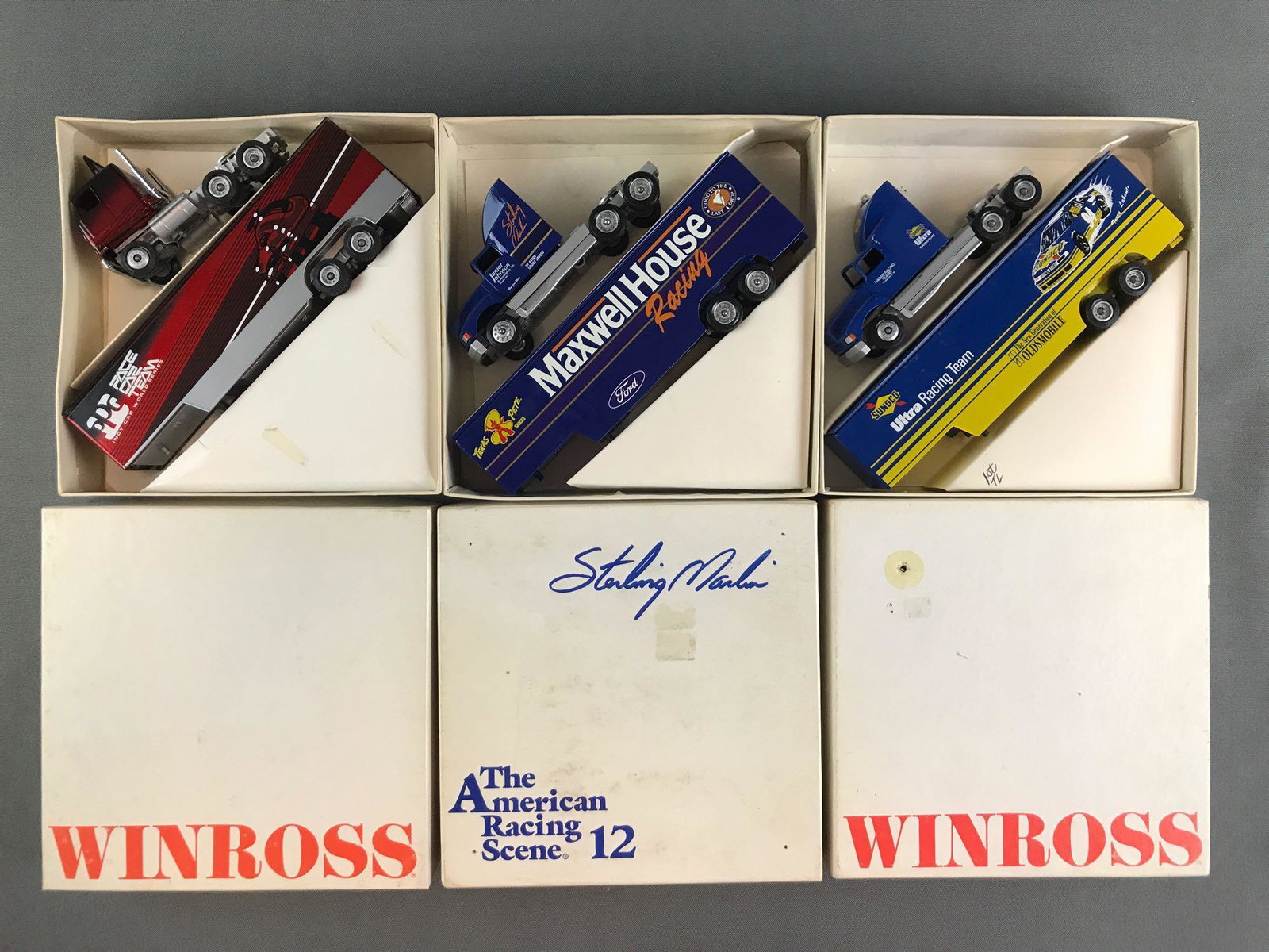 Group of 3 Winross die-cast Transporters in original: 1/64 scale PPG Pace Car Team, Sterling Marlin Maxwell House Racing, and Terry Labonte Sunoco Ultra Racing Team