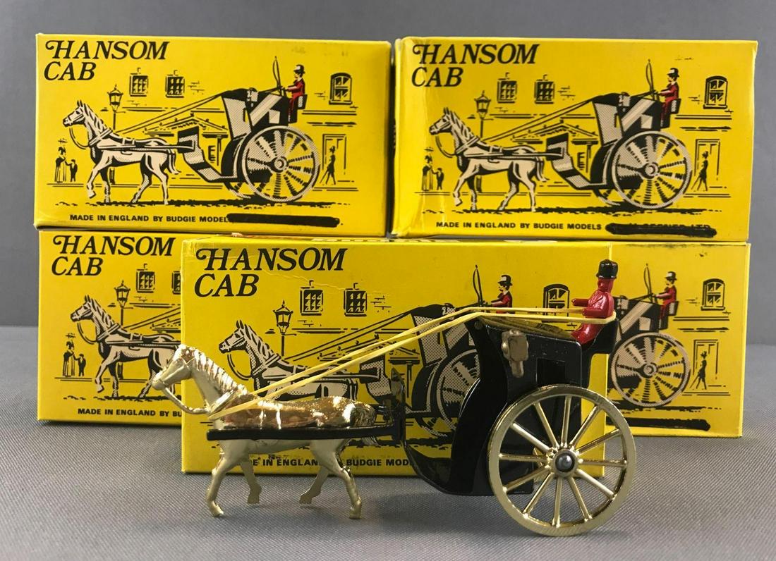 Group of 6 Budgie Models No. 100 Hansom Cab die-cast: New in original packaging. Some damage to some boxes. Black cab, gold wheels and horse. Appx 4.75 inches