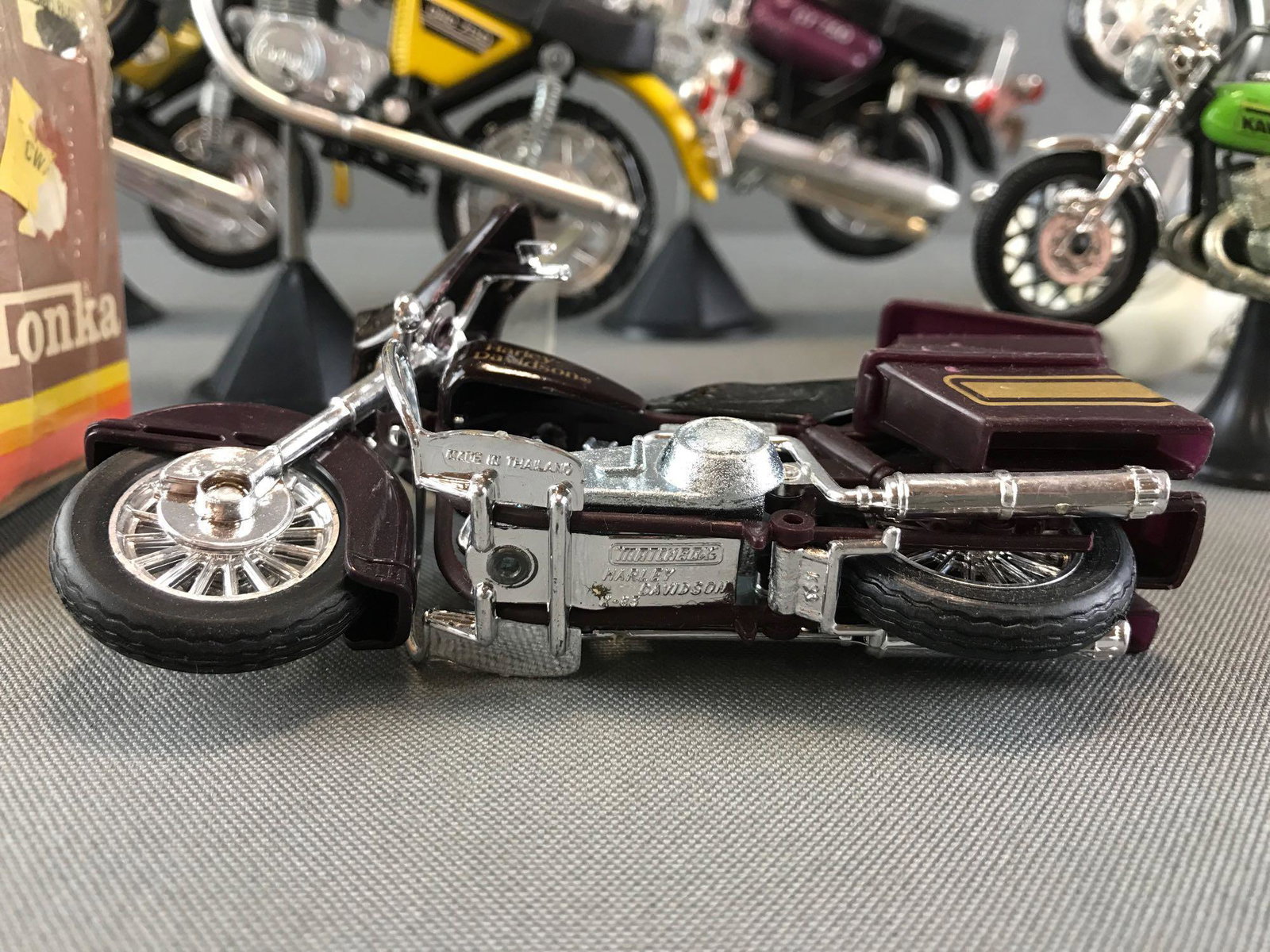 Group of 8 assorted die-cast and plastic motorcycles: Matchbox, Tonka, and more. Largest is 6.5 inches. Some damage-glue/epoxy, broken side mirror