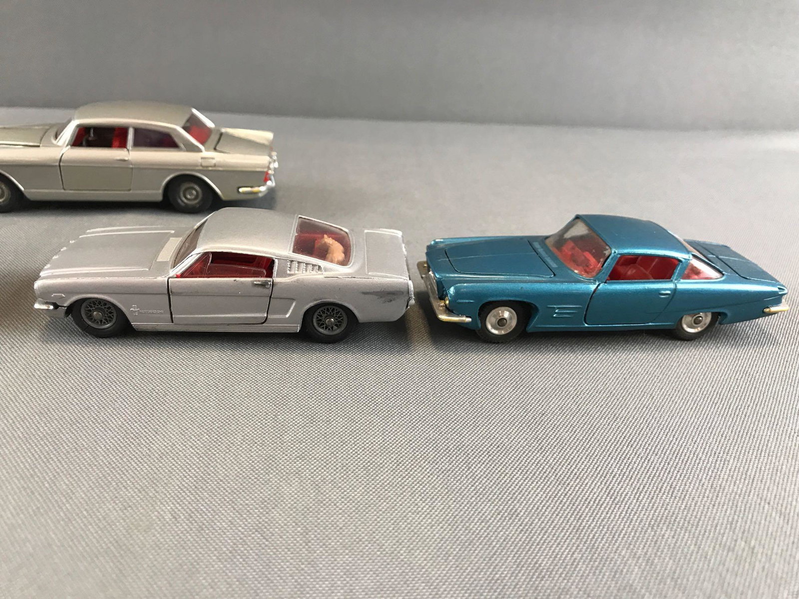 Group of 6 Corgi Toys, Politoys die-cast vehicles: 1:43 scale. Corgi Toys Ghia L6.4 with Chrysler V8 Engine, (2) Ford Mustang Fastback 2+2, Mercedes-Benz 350 SL, and Politoys Rolls Royce. Used condition