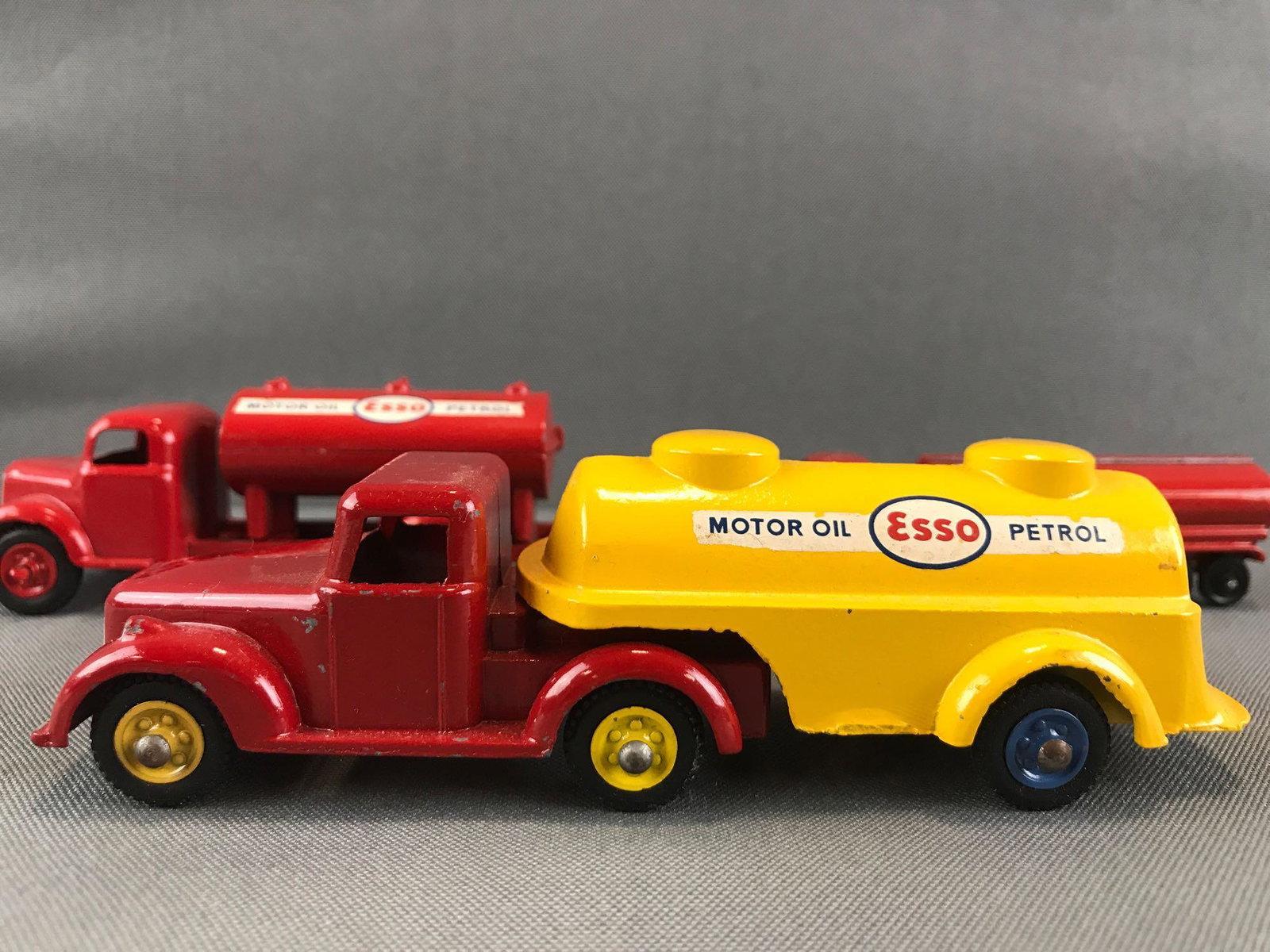 Group of 3 assorted toy tractor-trailers: Largest is 6 inches-Ben Bros, smallest is 4.25 inches-Tootsie Toy