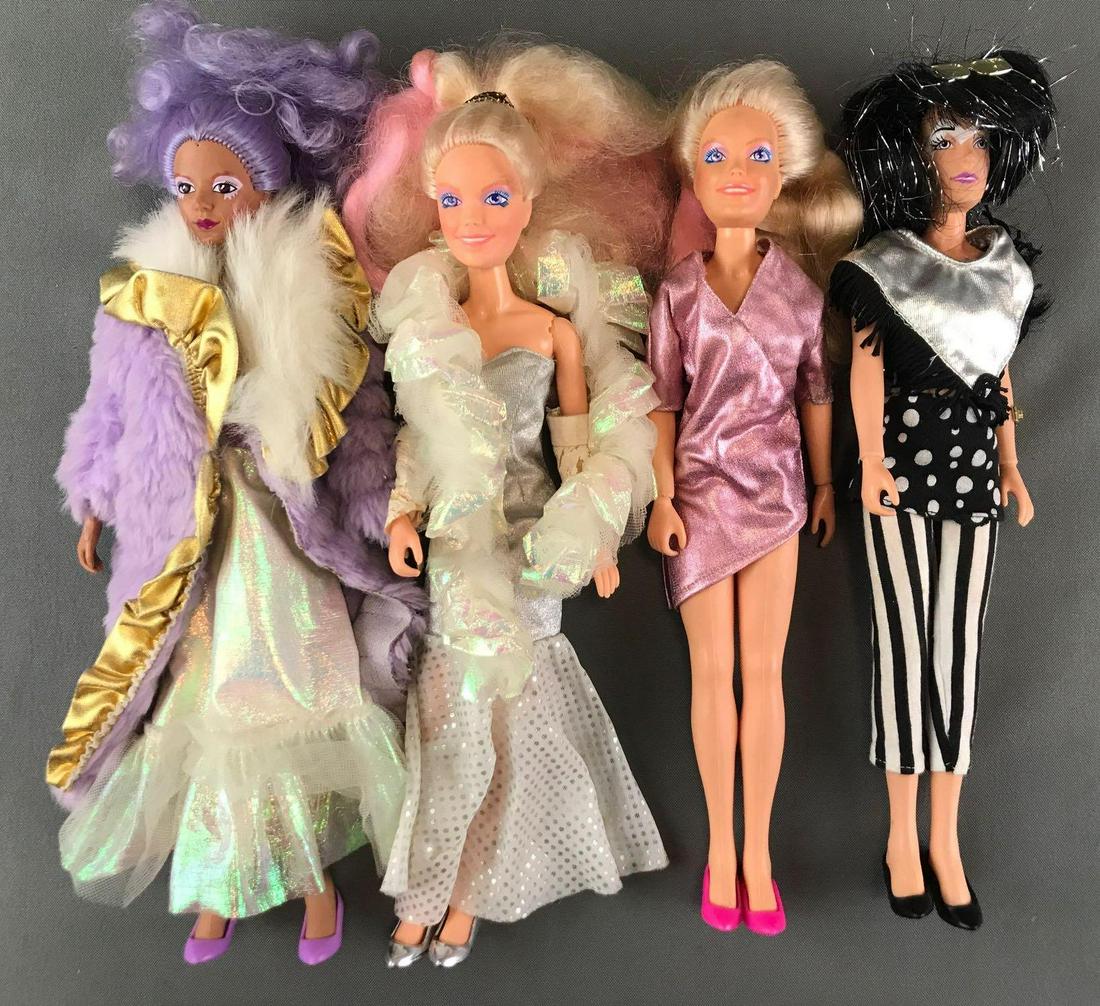 Group of 4 1985 Hasbro Jem and the Holograms dolls: Includes (2) Jem, (1) Shana, and (1) Roxy doll. Some original clothes. Dolls are appx 13 inches