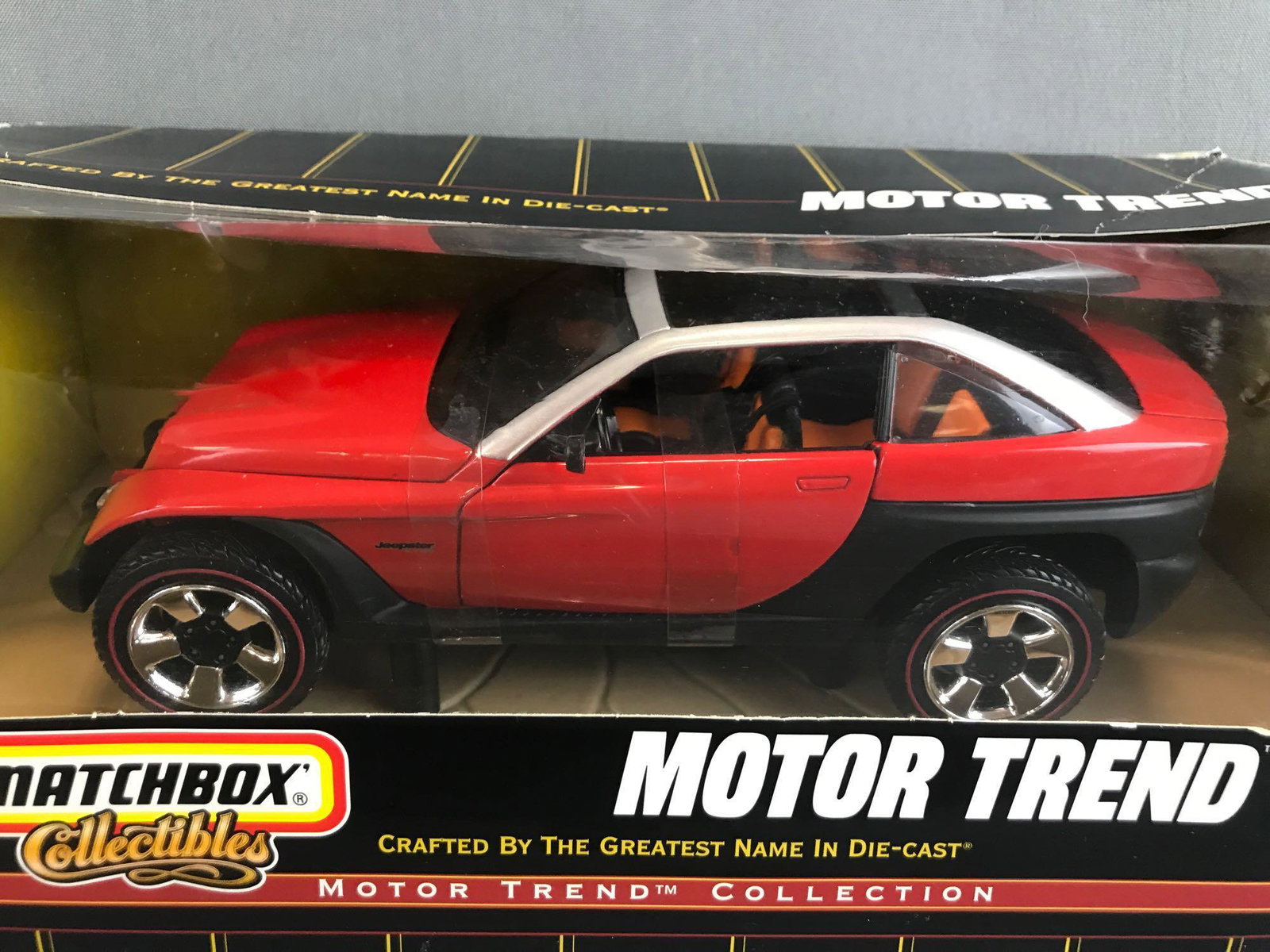 Group of 2 Matchbox Collectibles die-cast vehicles in: 1:18 scale Motor Trend Collection Jeepster Concept Vehicle and D.A.R.E. Collection Chevy Suburban. Shelf wear and package damage