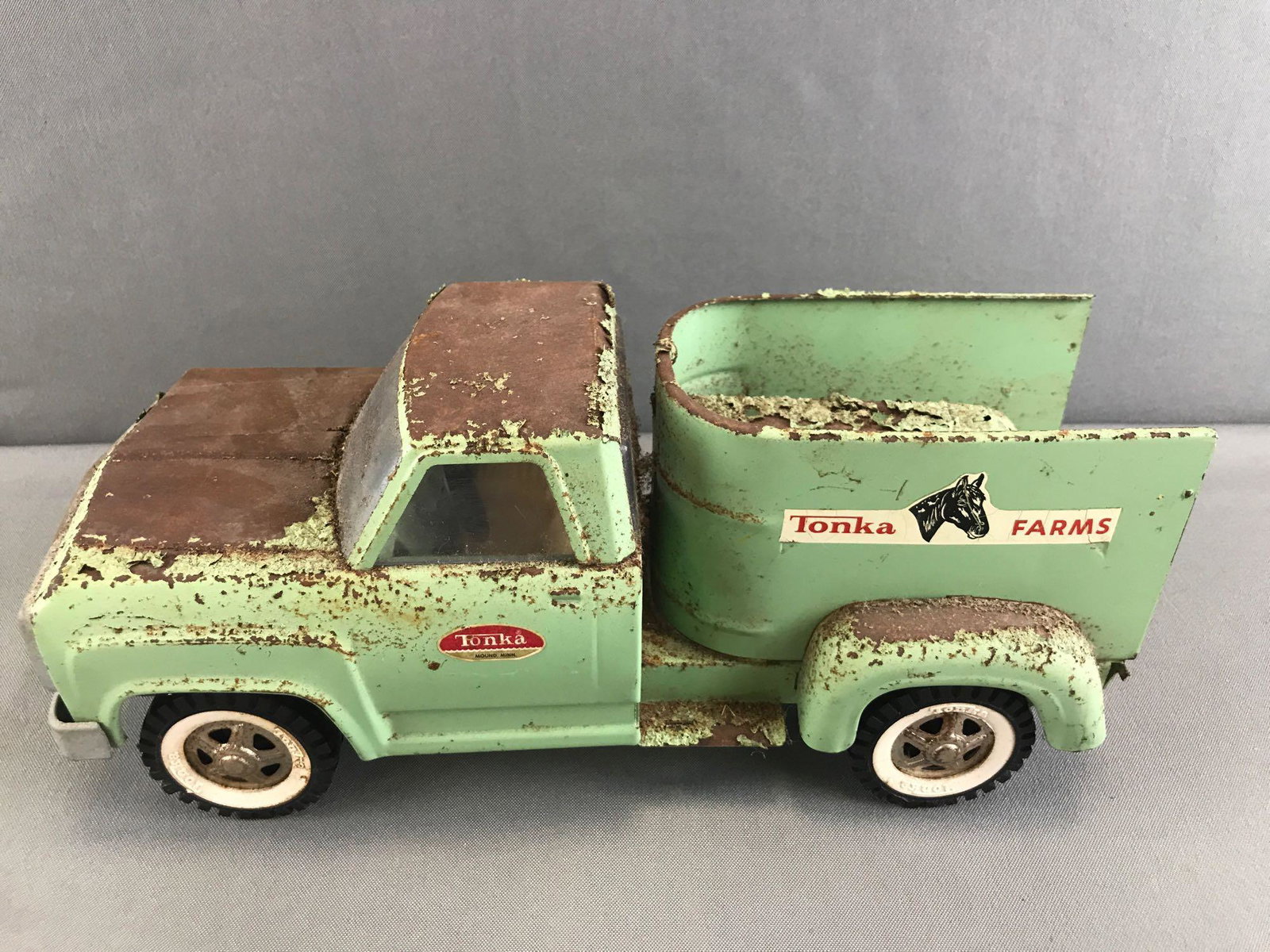 Vintage 1968 Tonka No. 2430 Tonka Farms Horse Truck: Pressed Steel, Appx 13 inches. Missing tail gate. Rusty