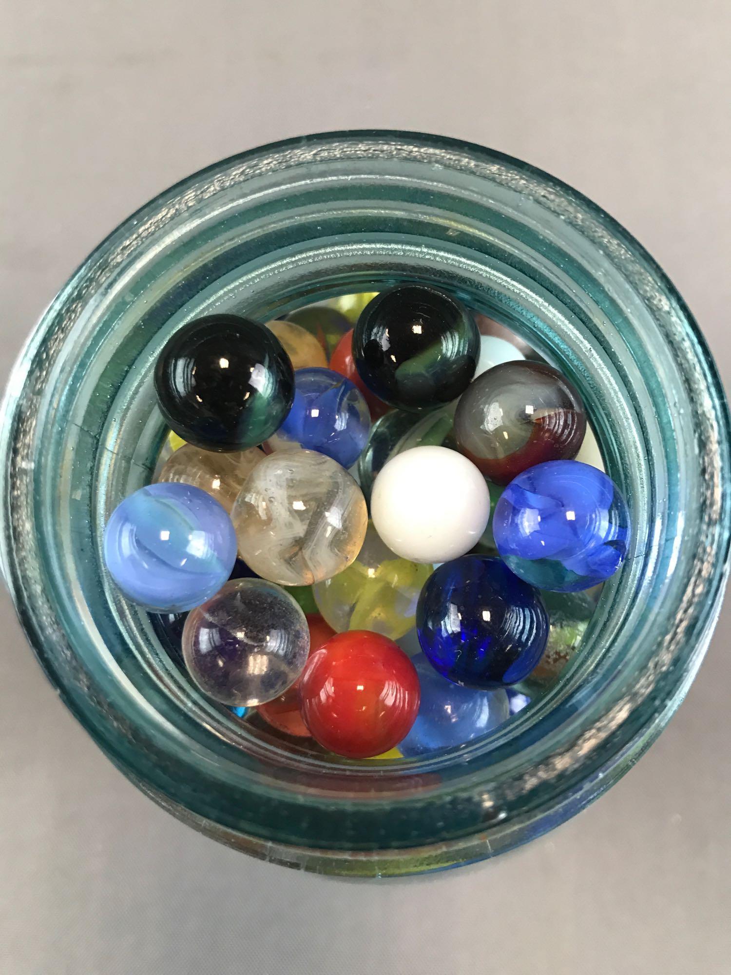 Marbles-Quart size Ball Canning jar full: Jar is appx 3.5x7 inches. Assorted colors, sizes, and types
