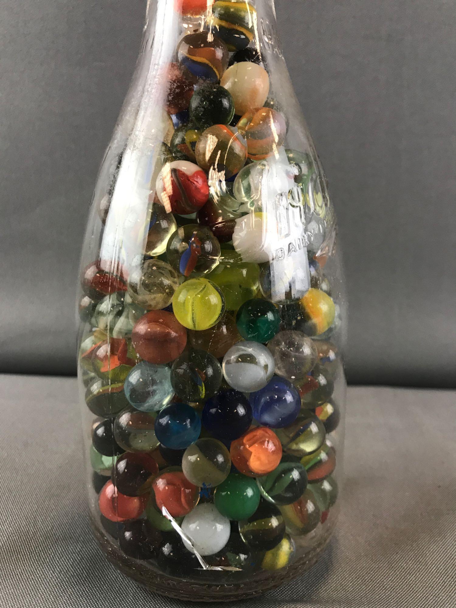 Marbles-Quart size Gridley Dairy Products glass milk: Jar is 4x8.5 inches. Assorted colors, sizes, and types