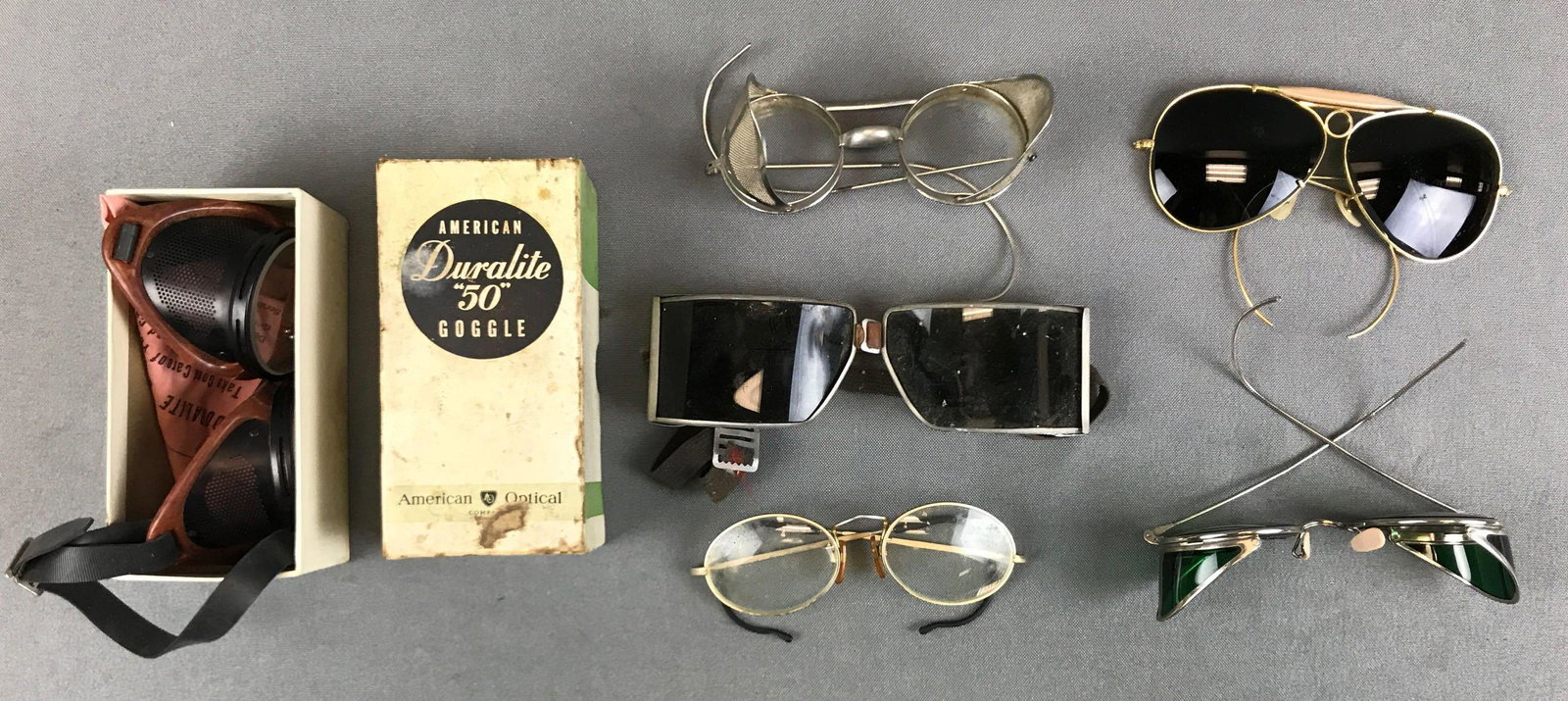 Group of 6 : Vintage Glasses, Sunglasses and Safety: Lot features a pair of American Duralite"50" safety goggles in their original box.