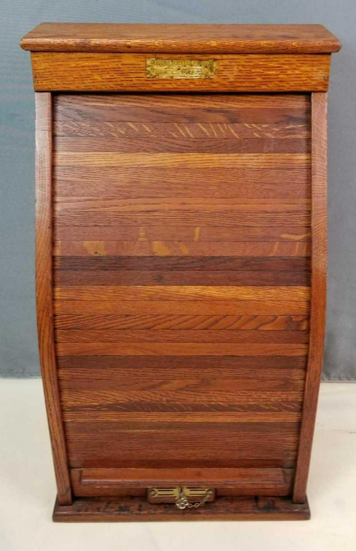 "National Ticket Case Company" Roll Top Cabinet: 15 1/2 x 27 inches. Includes railway tickets. Locking roll top with key. Nice condition, some wear consistent with age.