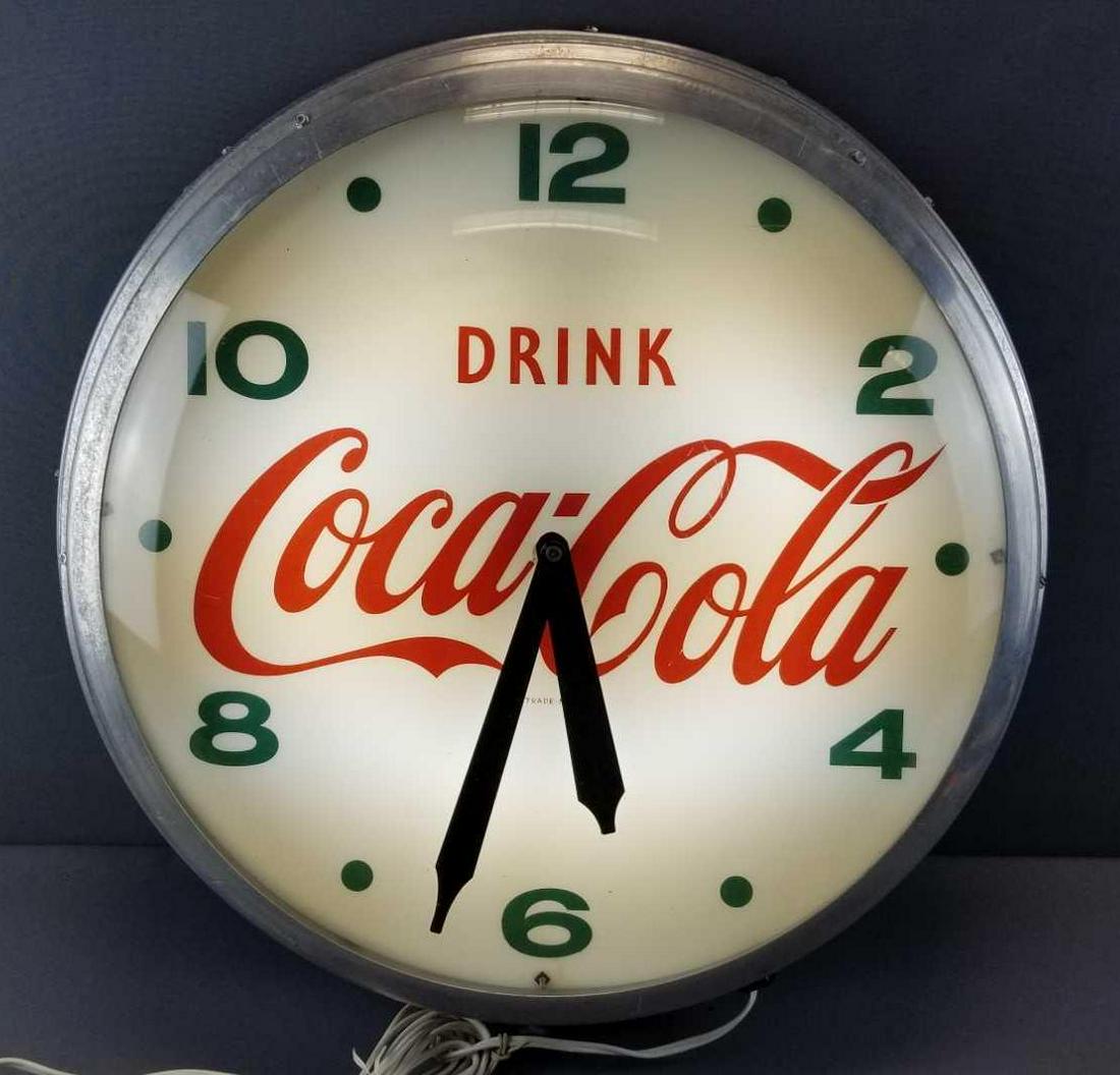 Vintage Coca-Cola Light Up Wall Clock: 22 inch diameter. Lights up; clock is untested