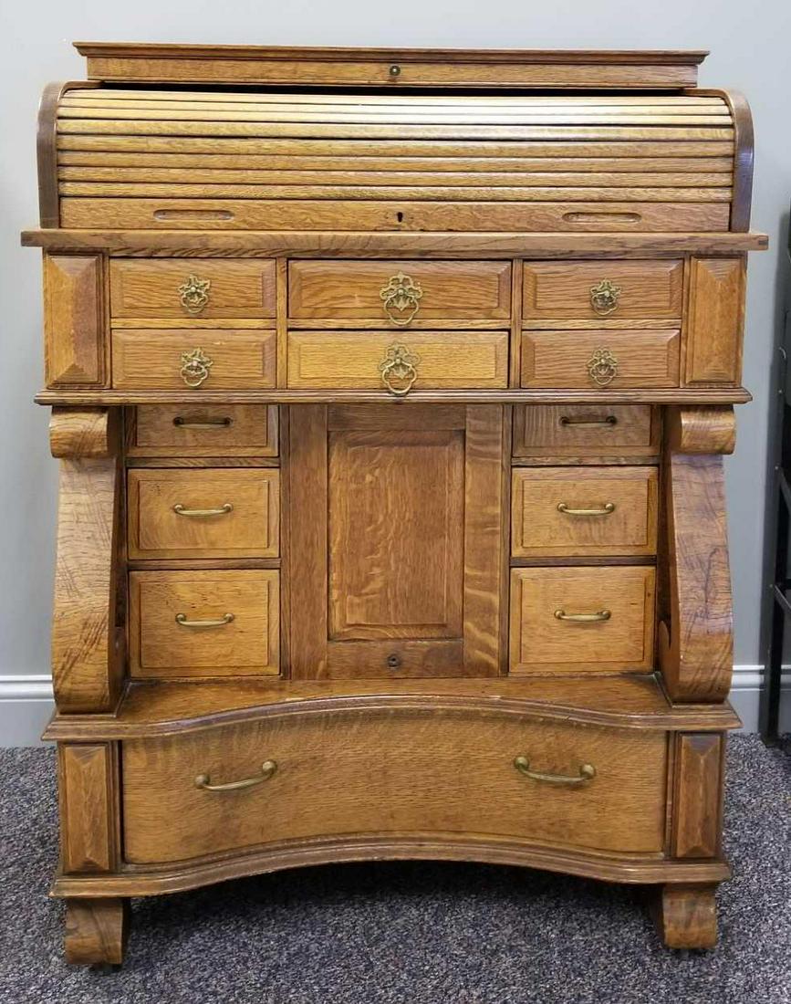 Antique UNIQUE Standing Roll Top Desk/Podium: Very unique and unusual design possilbly made fro a jeweler or watchmaker. Many individual drawers and locking doors. 35 x 49 x 11 inches. Nice condition; some minor wear consistent with age.In-house 