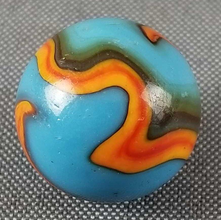 Vintage Peltier Collectible Superboy Marble: 23mm. Some flaws,National Line Rainbo, Blue, Red, Orange, Yellow Black.