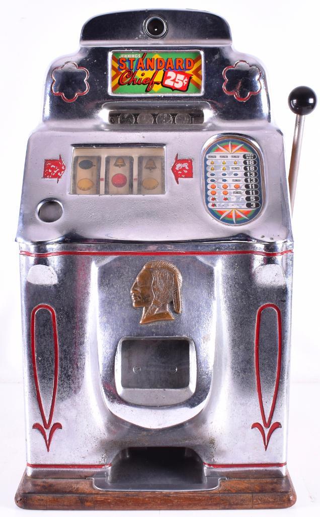 Antique Jennings Standard Chief 25 Cent Slot Machine: 15 1/2 x 15 1/2 x 27 1/2 inches. Working condition; includeskey