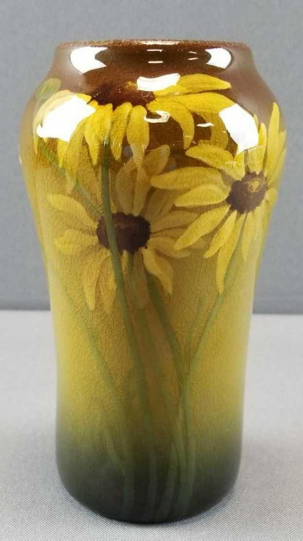 Rookwood (1906) Standard Glaze Vase with Daisies -: An unusually striking 6 inch tall Rookwood vase features a bouquet of daisies. Base carries an incised Rookwood mark (1906); production number, "935E" ; and the artist's initials, "KY".Crazing