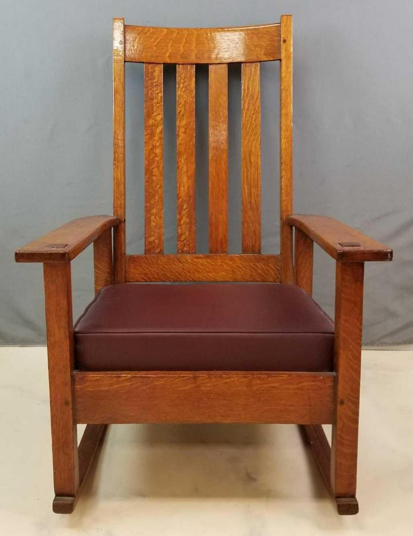 Vintage Craftsman Stickley Brothers Rocking Chair: 27 x 40 inches. Some wear consistent with age. In-house shipping is not available for this lot; arrange third party shipping or pick up at our Gallery in Ottawa