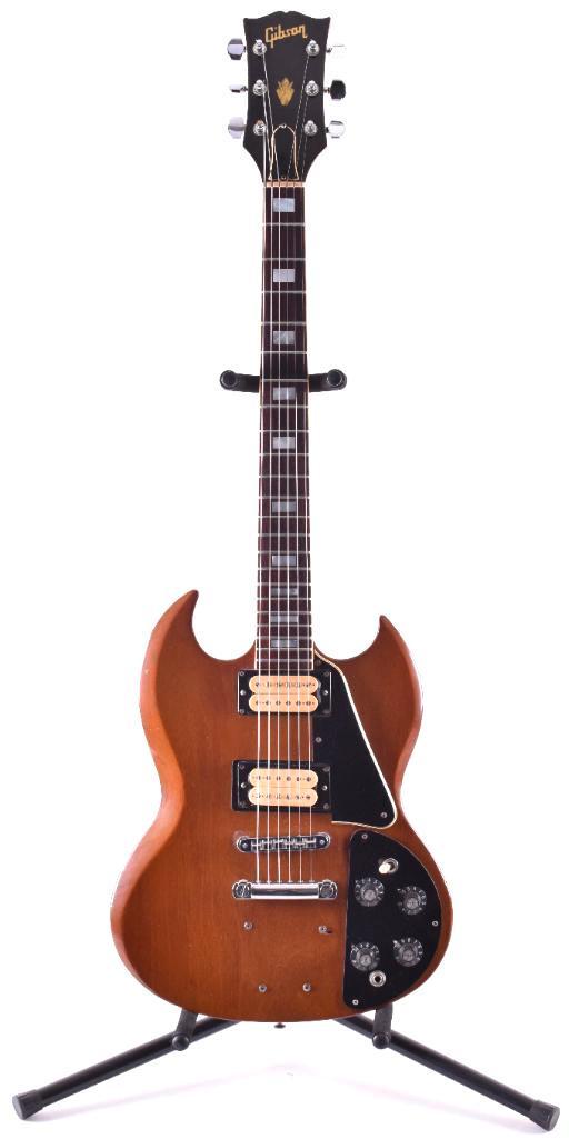 1972 Gibson Deluxe SG Electric Guitar with Case: Serial Number 676040, Made in the USA, Modified, different tail piece, upgraded Gibson tuners, Nashville Bridge, changed pickups. Professionally cleaned and restrung. 39 x 13 1/2 inches