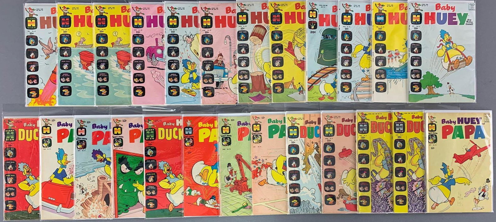 Group of 20 Plus Harvey Comics Baby Huey Comic Books: Bagged and boarded, includes duplicates .