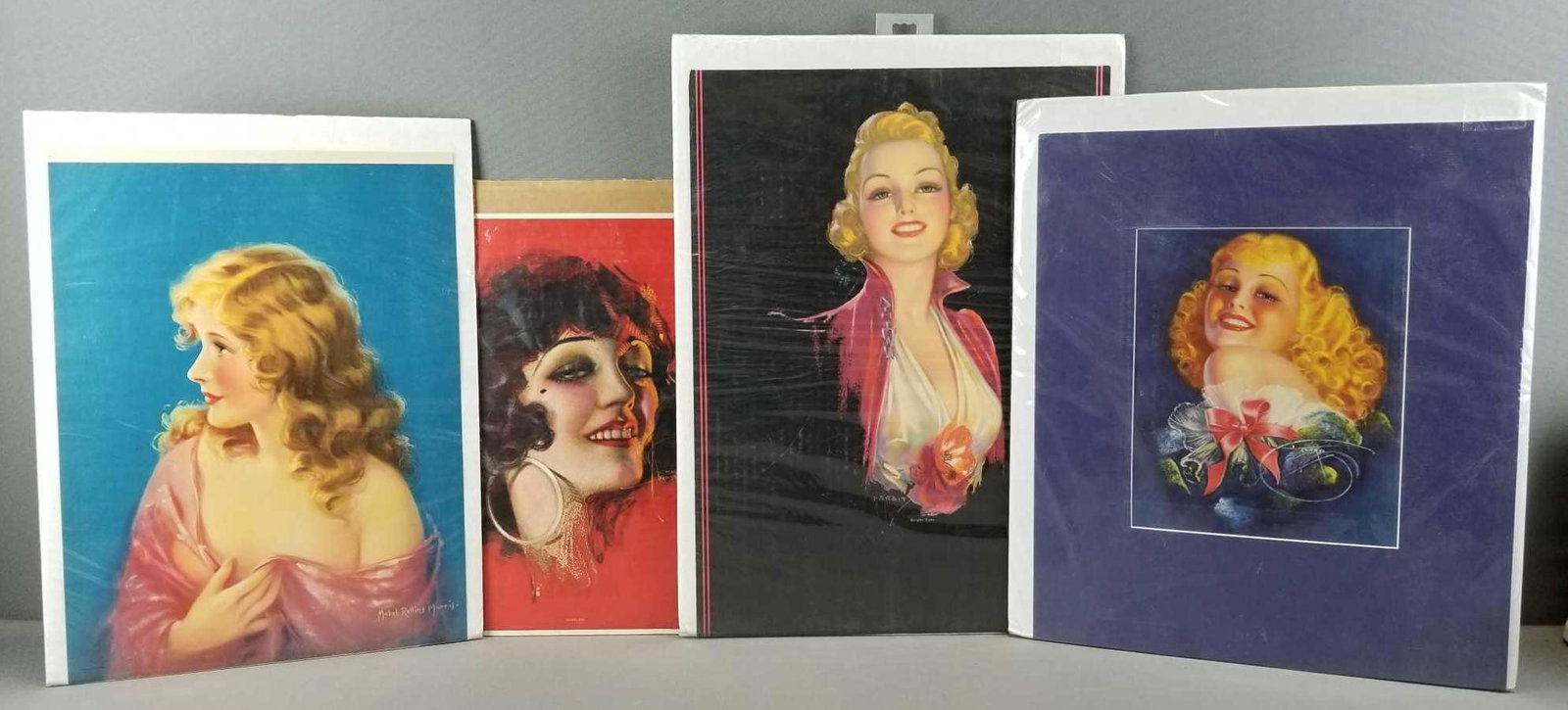 Group of 4 vintage pinup prints: Harris, J Erbit, DeVorss. Largest is 14 x 19