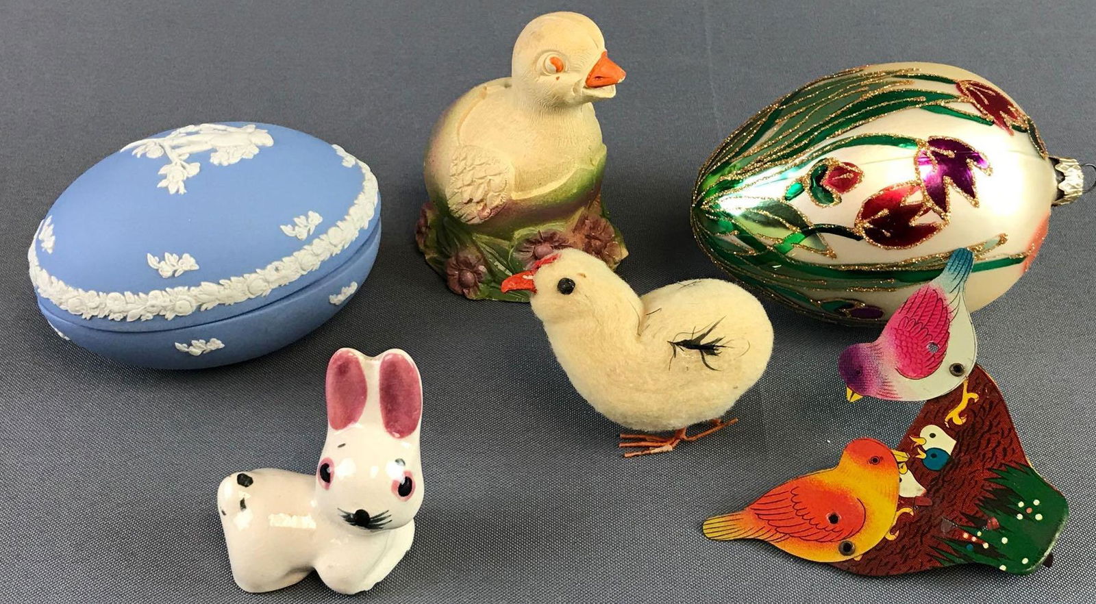 Group of 6 Vintage Figurines and More: Includes ornament, trinket box, tin toy, figurines and more. Largest measures 5.25x3.25 inches.