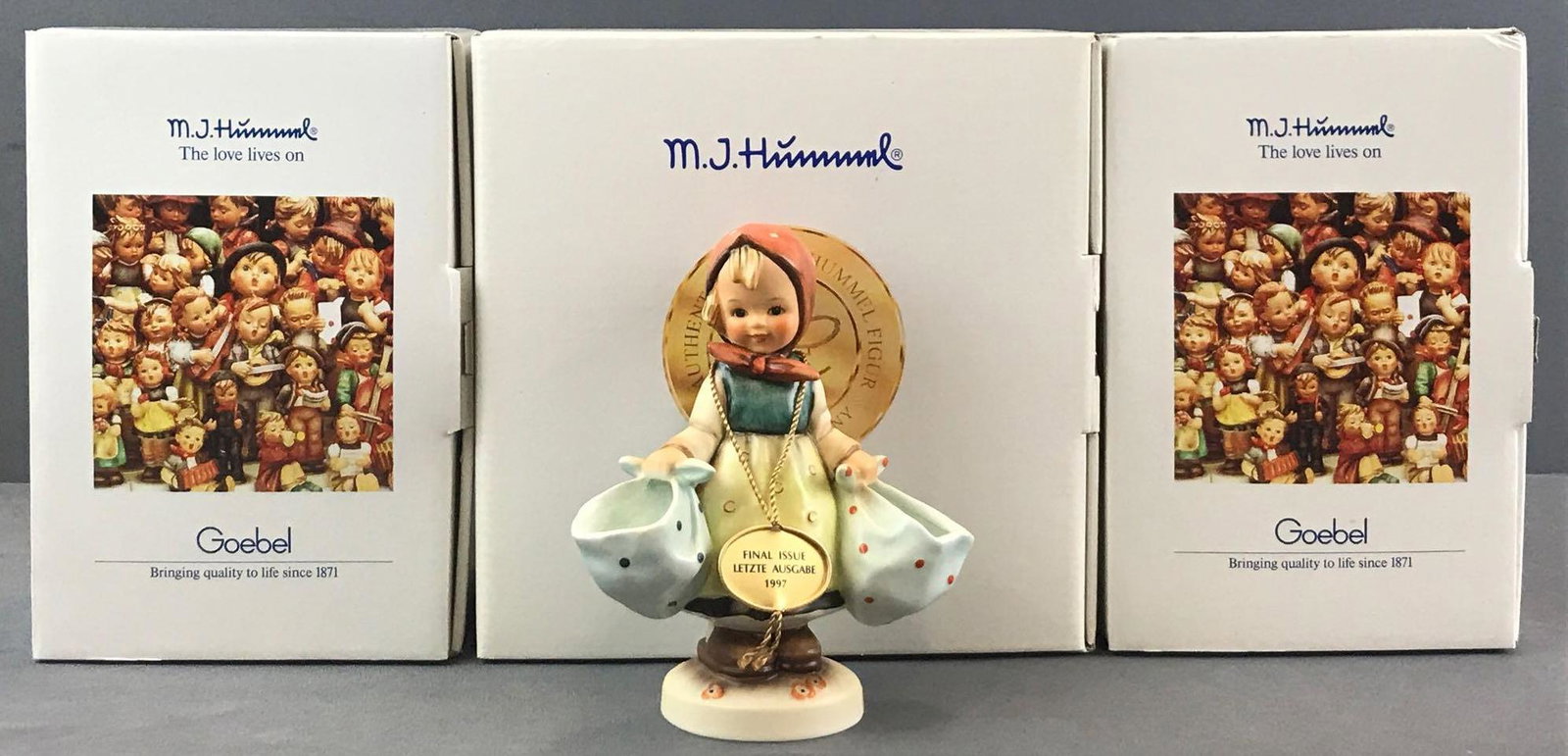 Group of 3 Goebel M.I. Hummel figurines in original: Like new condition. Includes No. 858 Mothers Darling-Final Issue, signed (pictured)-5.25 inches, No. 951 Happy Pastime, and No. 890 Duet