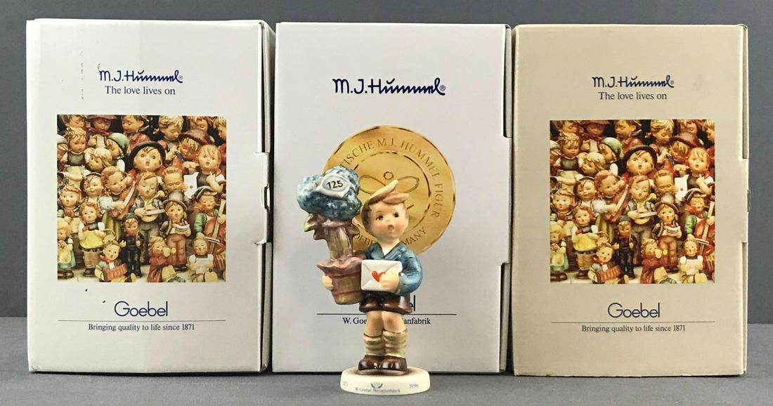 Group of 3 Goebel M.I. Hummel figurines in original: Like new condition. Includes No. 256 Horse Trainer, No. 1033 Good News (pictured) Special Edition-5 inches, and No. 882 Apple Tree Girl
