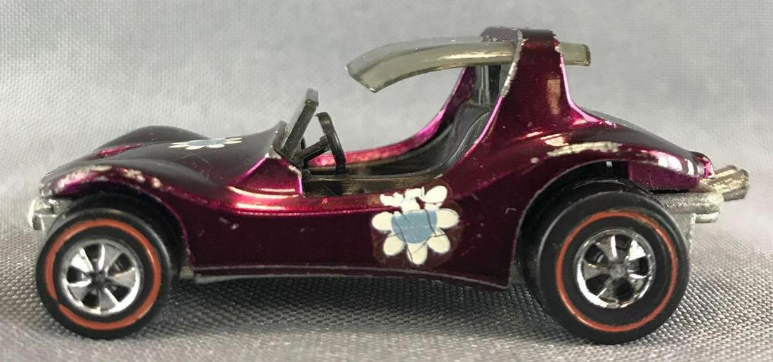 Hot Wheels Redline Sand Crab die-cast vehicle: 1969 Mattel, Inc. Magenta Body Color. Excellent Condition with visible wear throughout the edges and on decals. Black interior