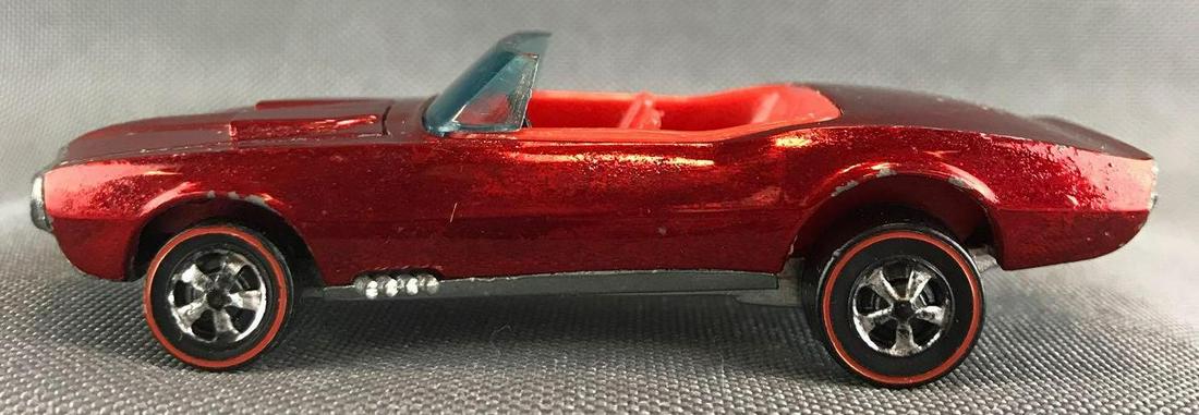 Hot Wheels Redline Custom Firebird die-cast vehicle: 1967 Mattel, Inc. Red Body Color. Near Mint Condition, some noticeable wear and toning upon close up inspection. Red interior
