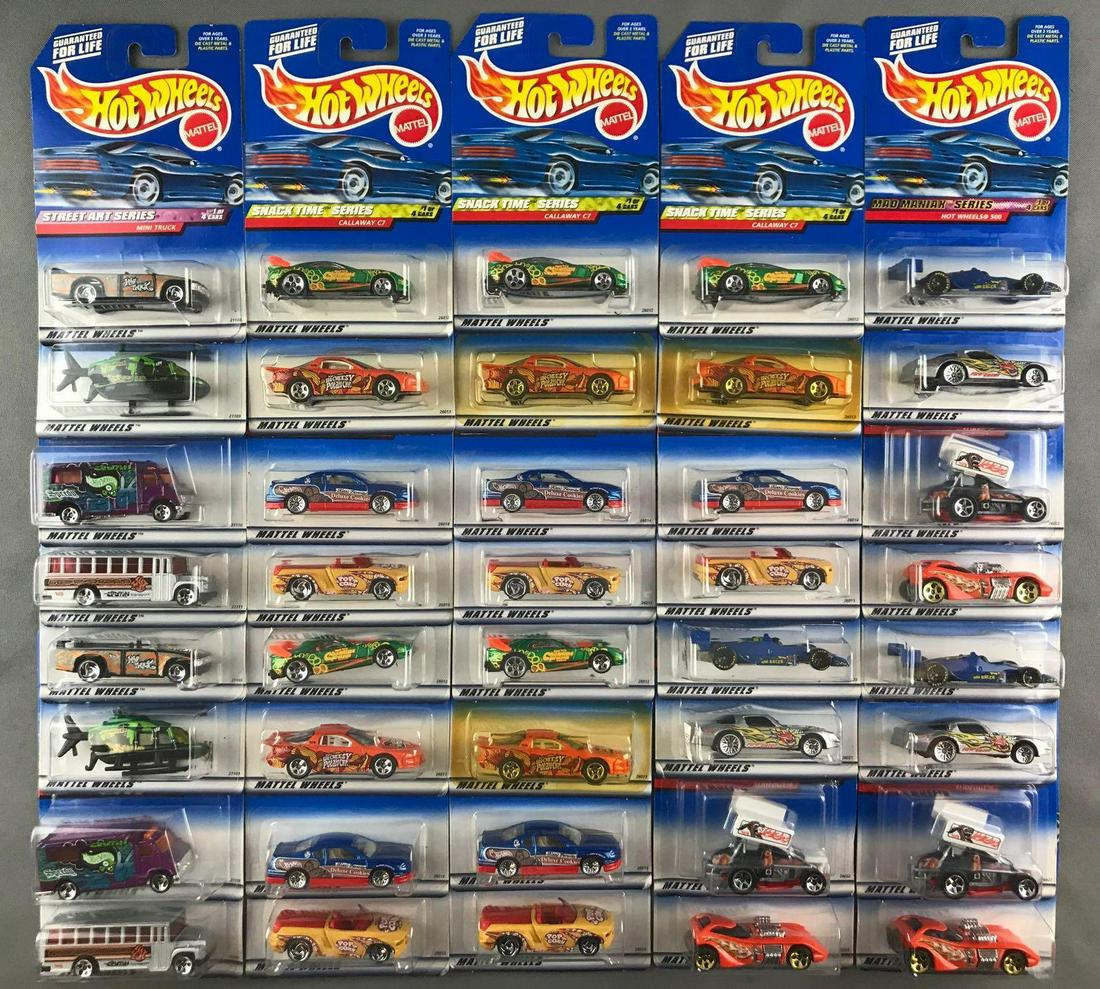 Group of 40 Hot Wheels die-cast vehicles in original: 4-vehicle series include Mad Maniax, Snack Time, and Street Art. Some minor wear to packaging