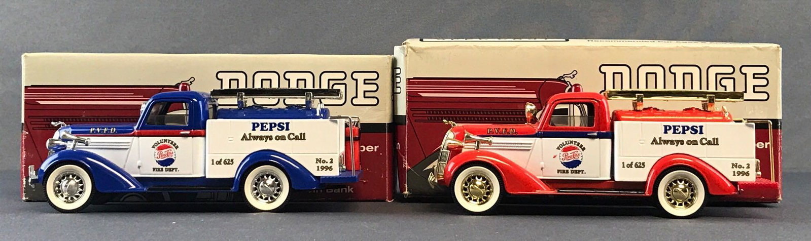 Group of 2 Spec Cast 1936 Dodge Fire Pumper die-cast: Liberty Classics 1:28 scale coin banks. Limited edition, both 1 of 625. Packaging has some shelf wear, like new condition.