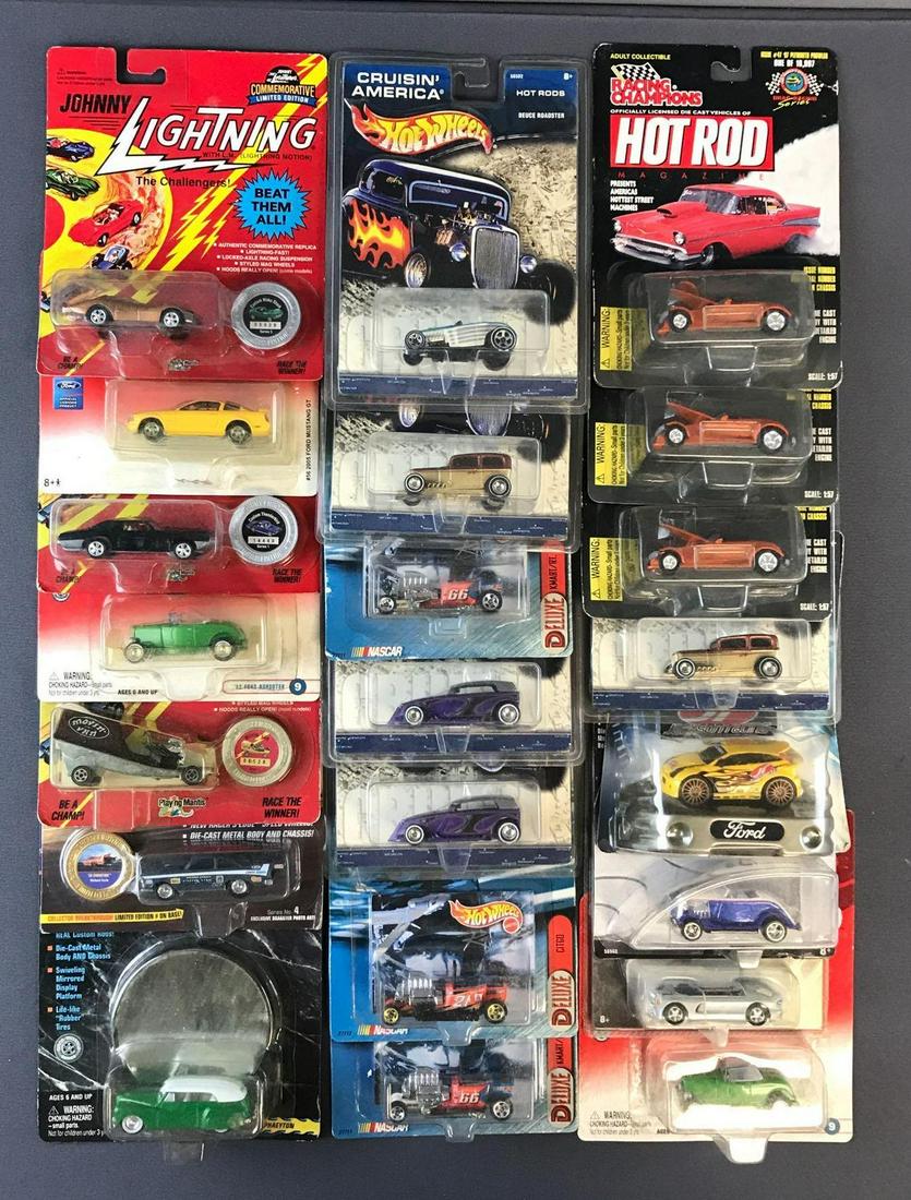Group of 23 assorted die-cast vehicles in original: Includes Johnny Lightning, Hot Wheels and Racing Champions. Includes duplicates, packaging has some shelf wear and dust from storage.