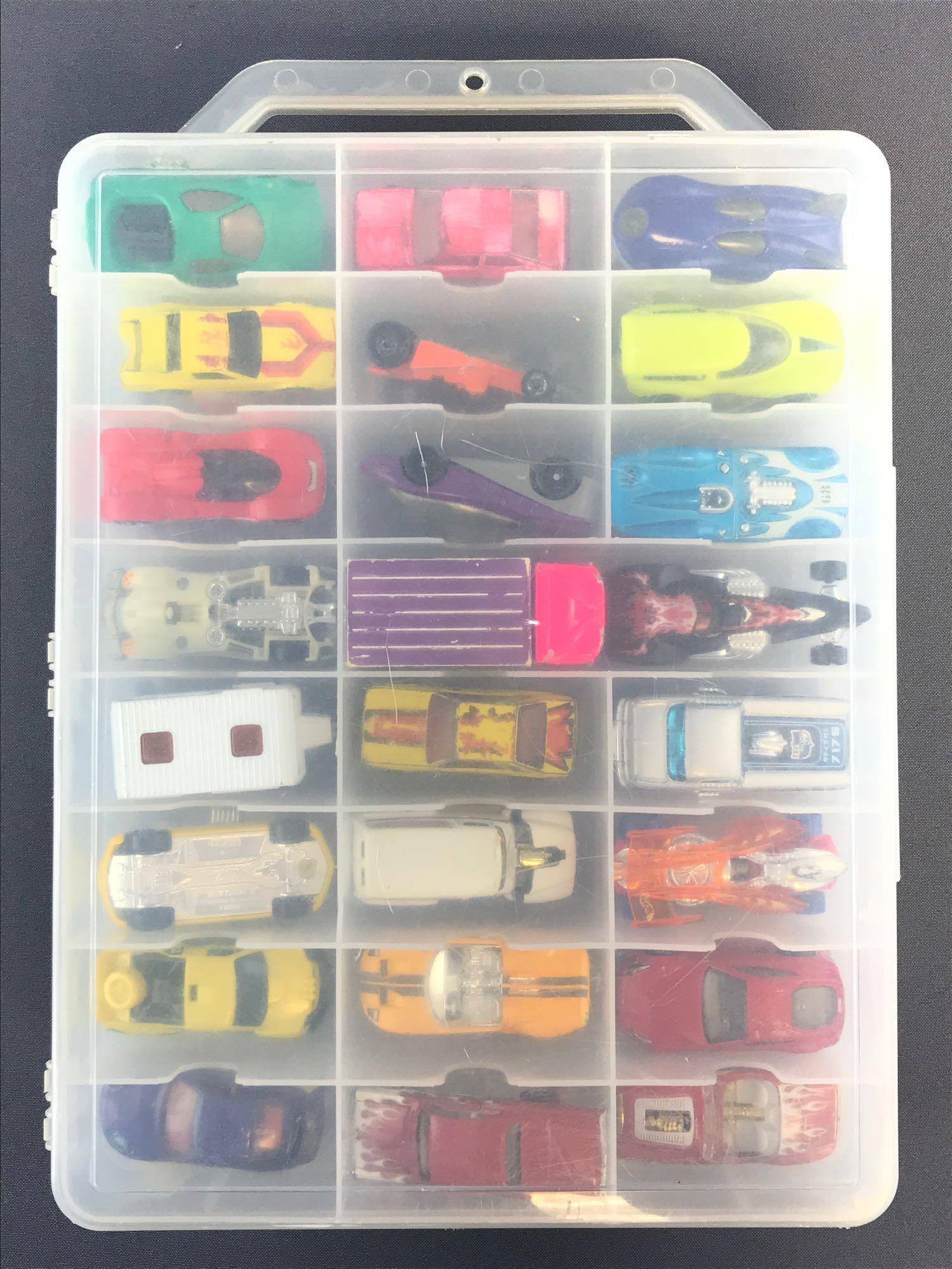 Group of 48 Hot Wheels die-cast vehicles in carrying: Case measures 14.5x10x3.25, in used condition.