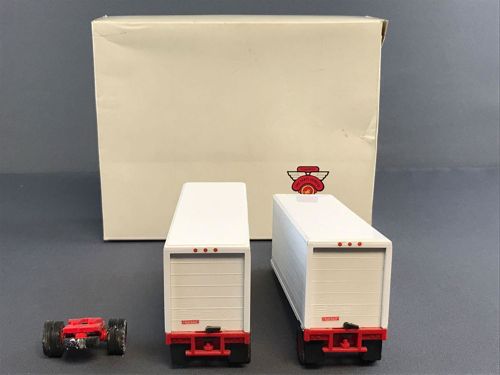 Group of 4 die-cast tractor trailers in original (1 of 18)