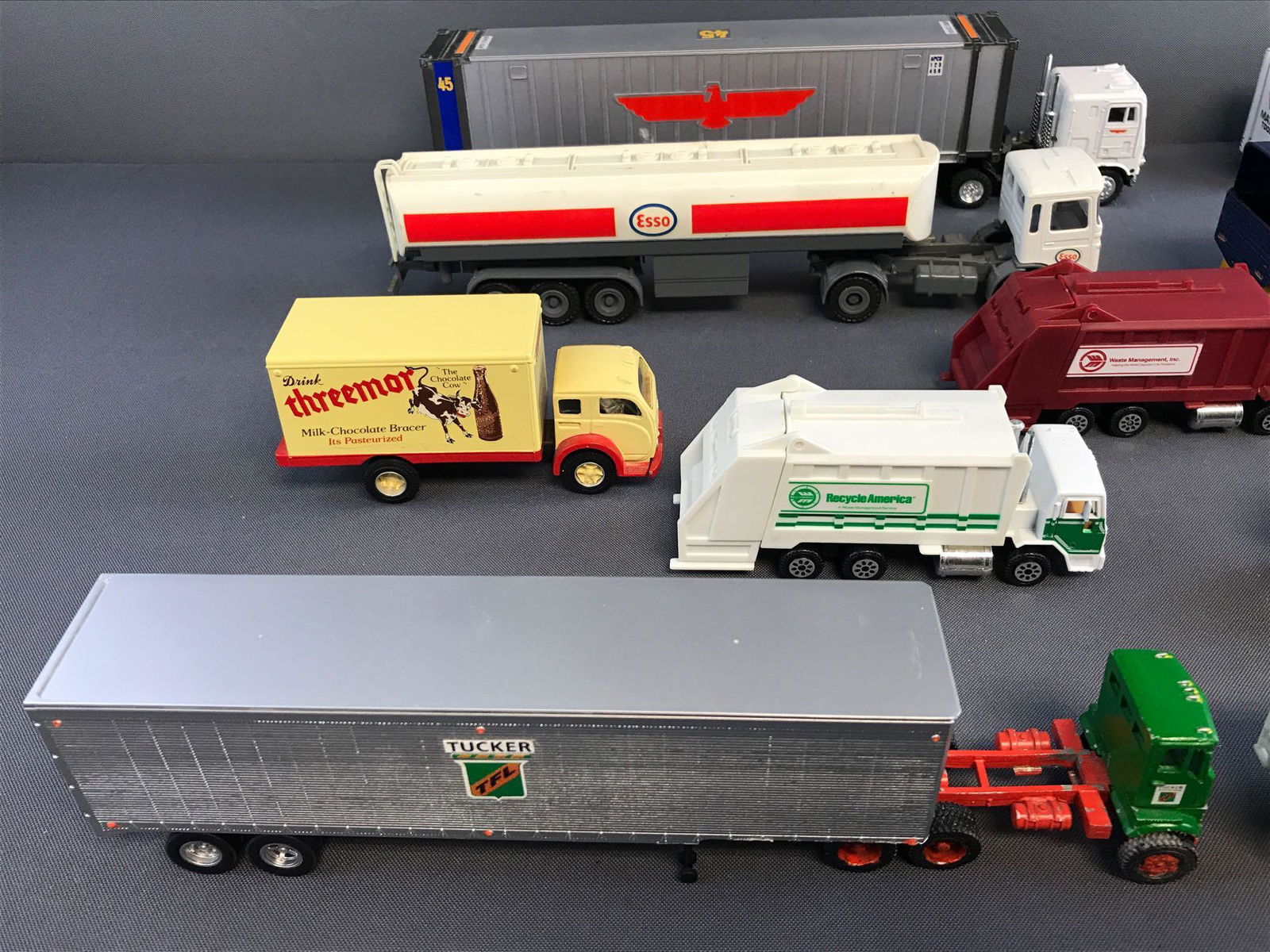 Group of 13 die-cast tractor trailers and more (1 of 5)