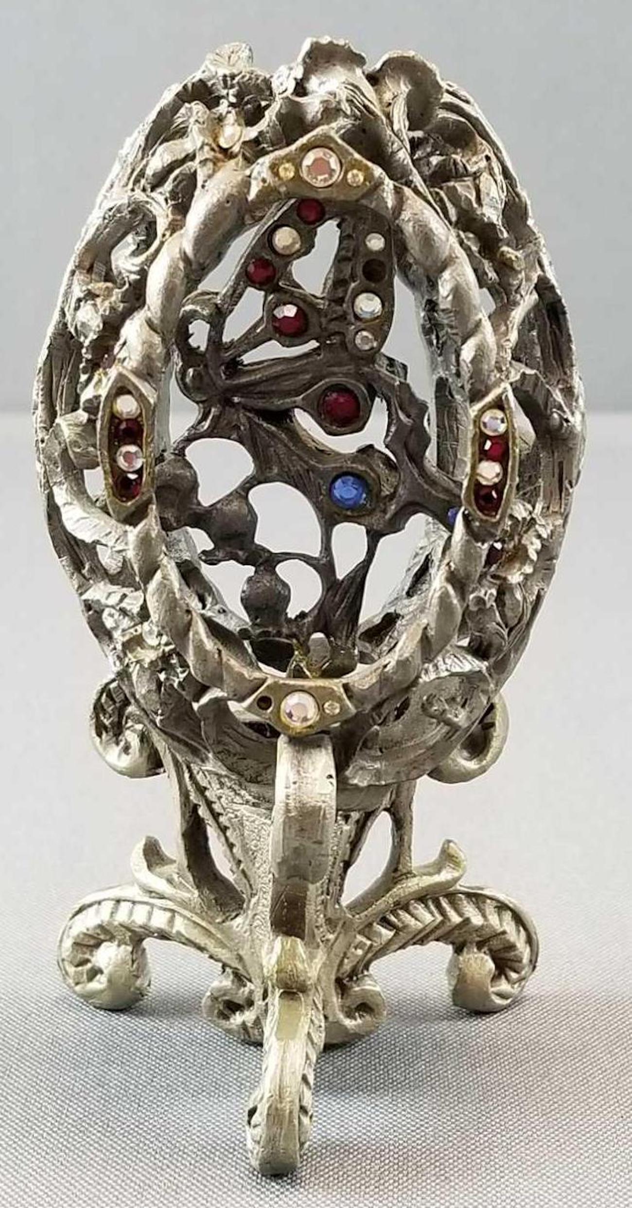 Sunglo pewter artwork: Butterfly in egg on stand, 4.5 inches tall. Dated 97.