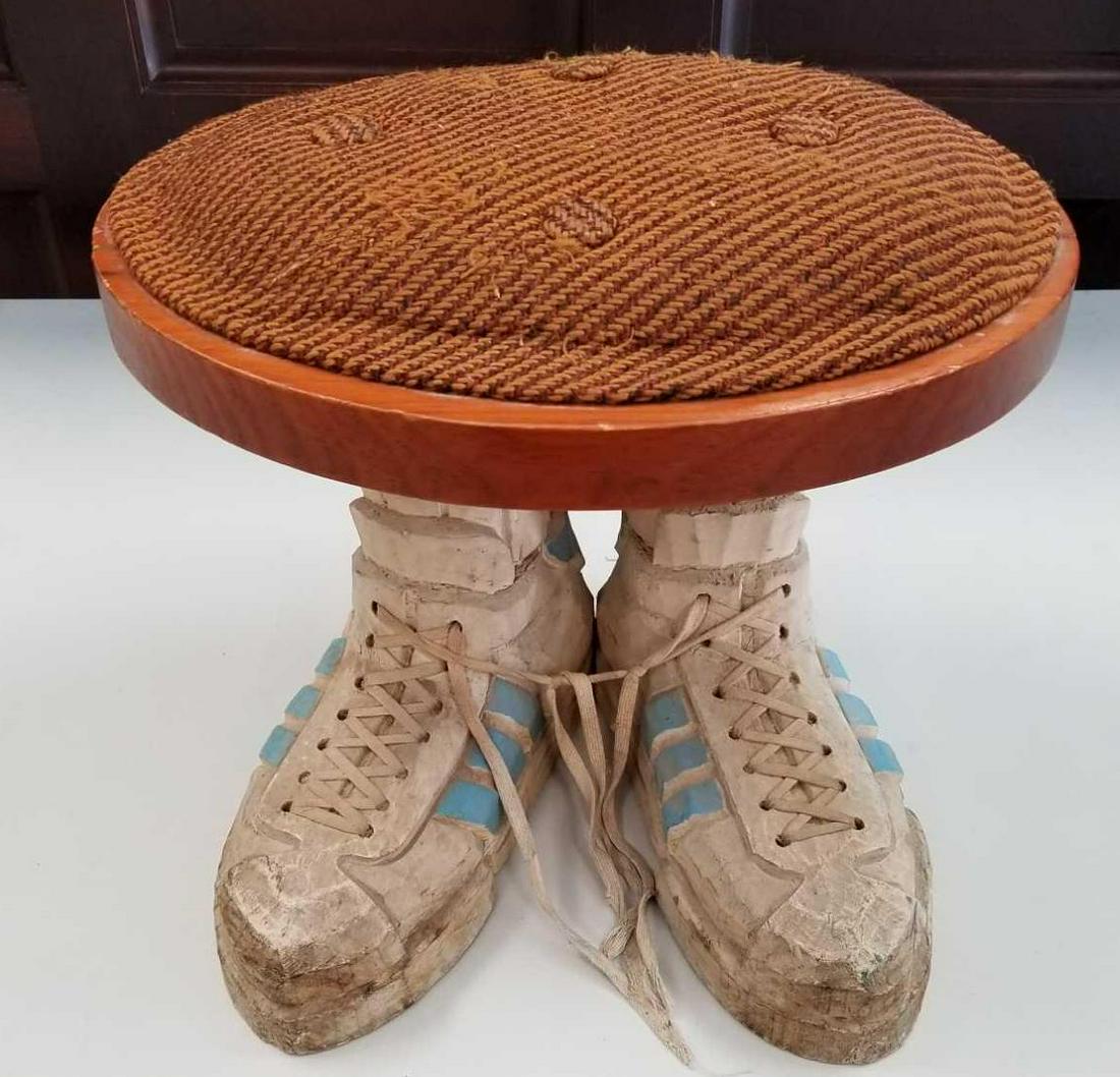 Vintage hand carved footstool: 13 inches tall, 16 inches wide.