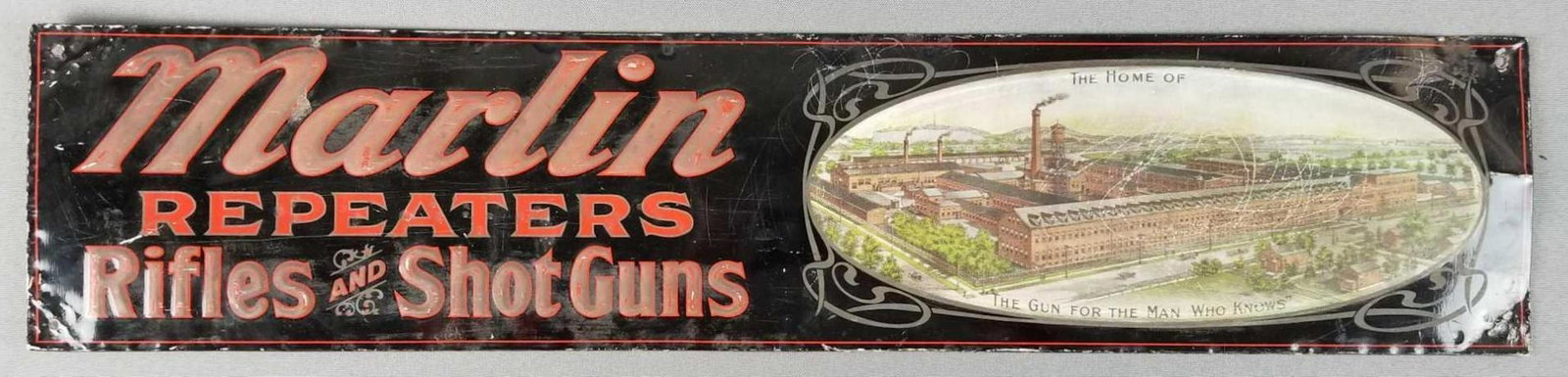 Metal Marlin repeaters sign: Reproduction Rifles and Shot Guns. Some wear. 27 x 6 inches. Reproduction.
