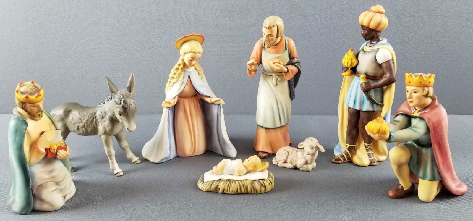 Vintage Goebel Hummel Nativity figurines #214: 1951. Includes 8 figurines. Tallest is 8 inches. Nice condition. Some crazing, no chips or cracks. Also includes #24/1 lullaby angel candle holder, small chip.