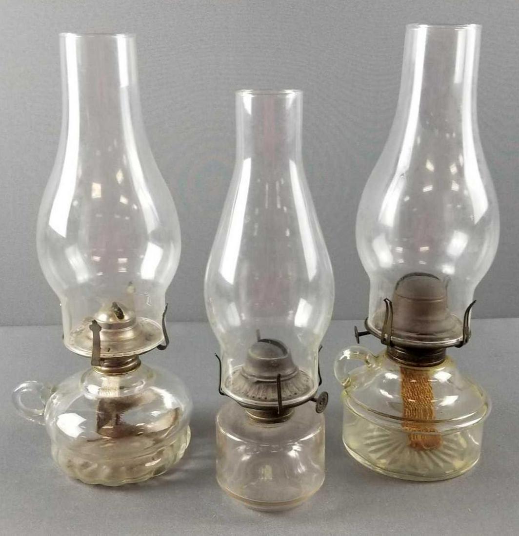 Group of 3 vintage oil lamps: Largest is 12.5 inches tall. One labeled Lamplight Farms