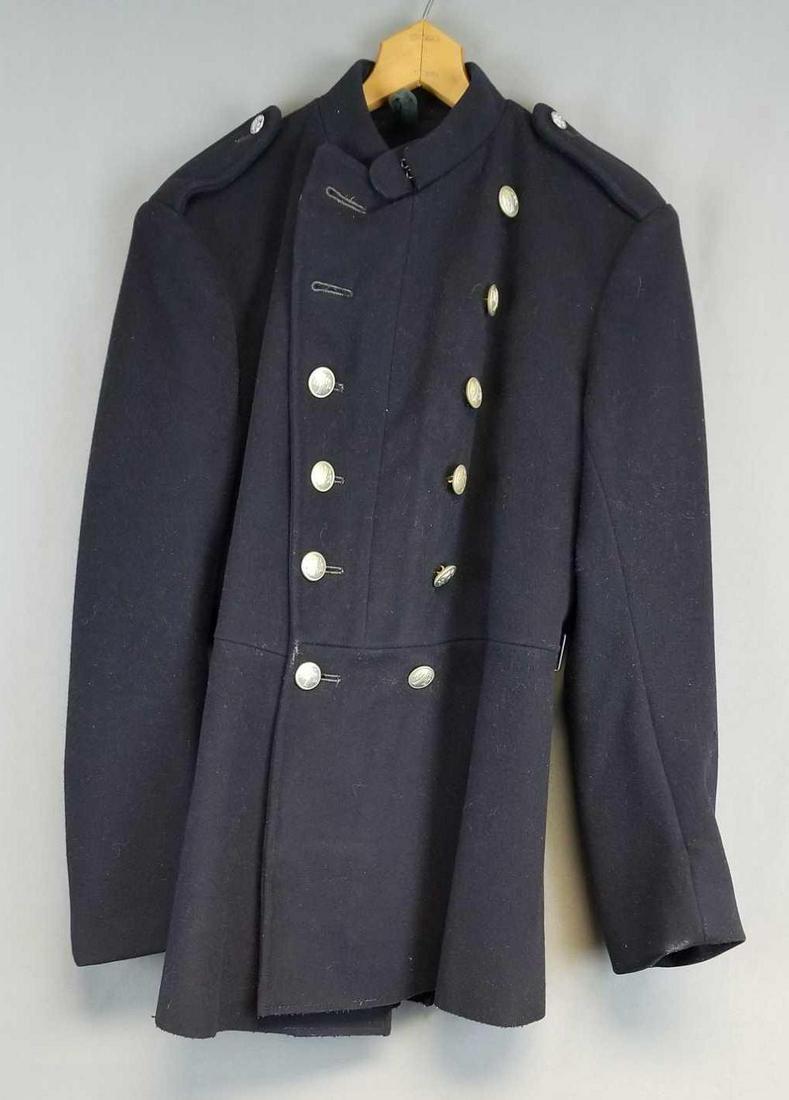 Vintage double breasted uniform jacket: Navy blue. Buttons read NFS. Some wear and pilling to bottom hem and sleeves. Tag reads tunic fire brigade, size 12. James Smith & co Derby