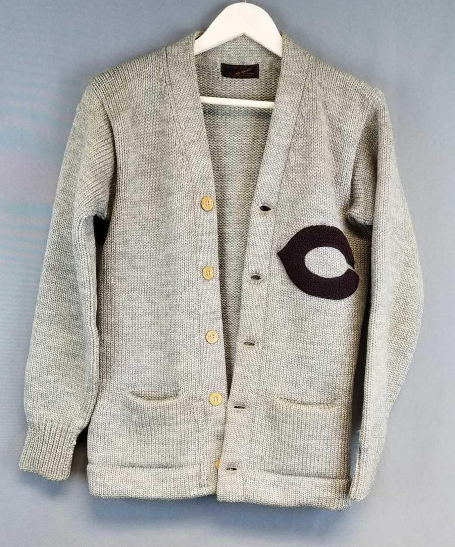 Vintage university of Chicago cardigan sweater: Nice condition, needs cleaned. Gray with maroon C. Shoulder to shoulder 17 inches, Length 26 inches, and outer sleeve 24 inches