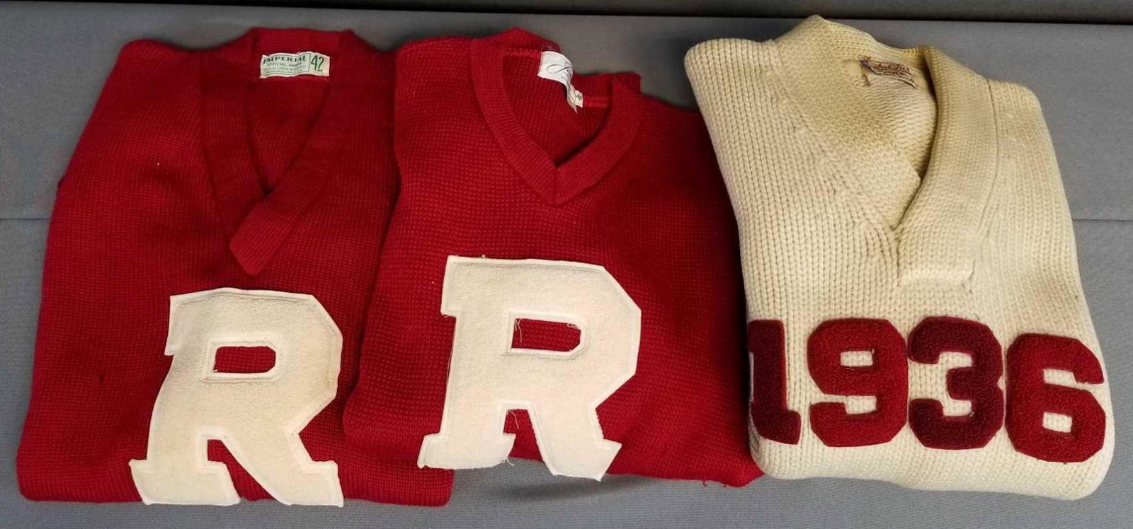 3 vintage letterman sweaters: Red and white. Needs cleaned. 2 with R, one 1936. All pullover