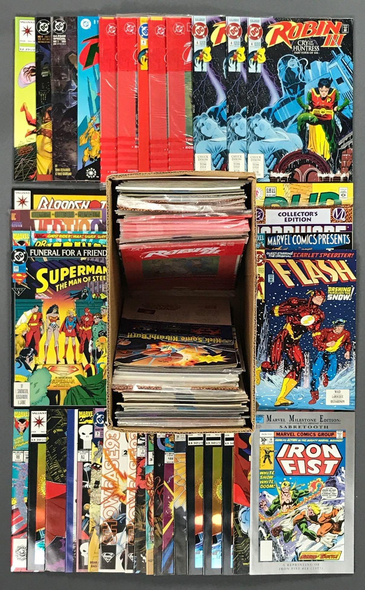 Short box approximately 100 assorted comic books: Includes Marvel, DC, Valiant and more featuring Batman, Superman, Dr. Strange and more. Includes w