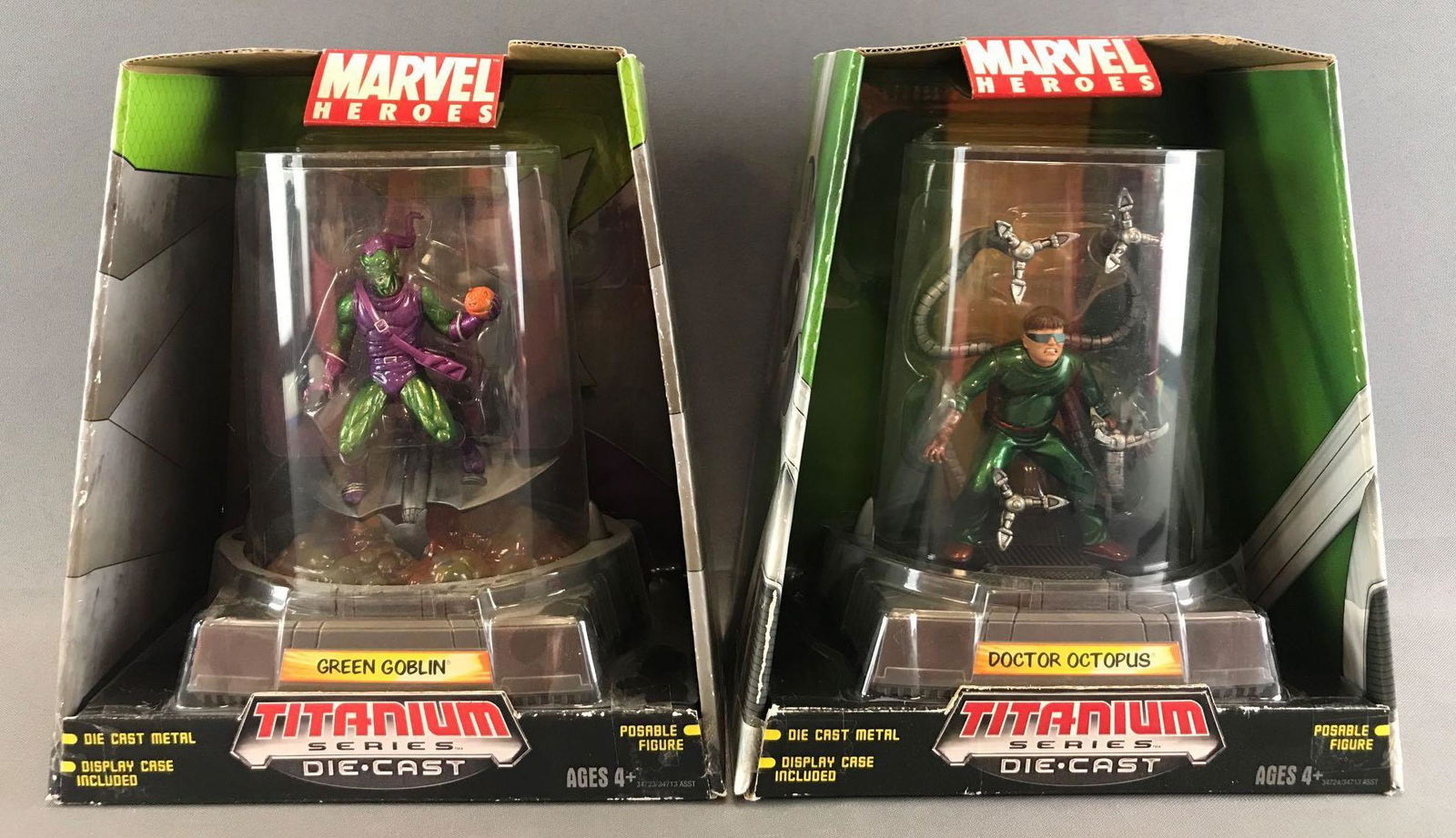 Group of 2 Hasbro Marvel Heroes Titanium Series: Includes Green Goblin and Doctor Octopus. Figures are appx 3.25 inches. Packaging measures 8x8.75x4.5 inches. Some minor wear to packaging